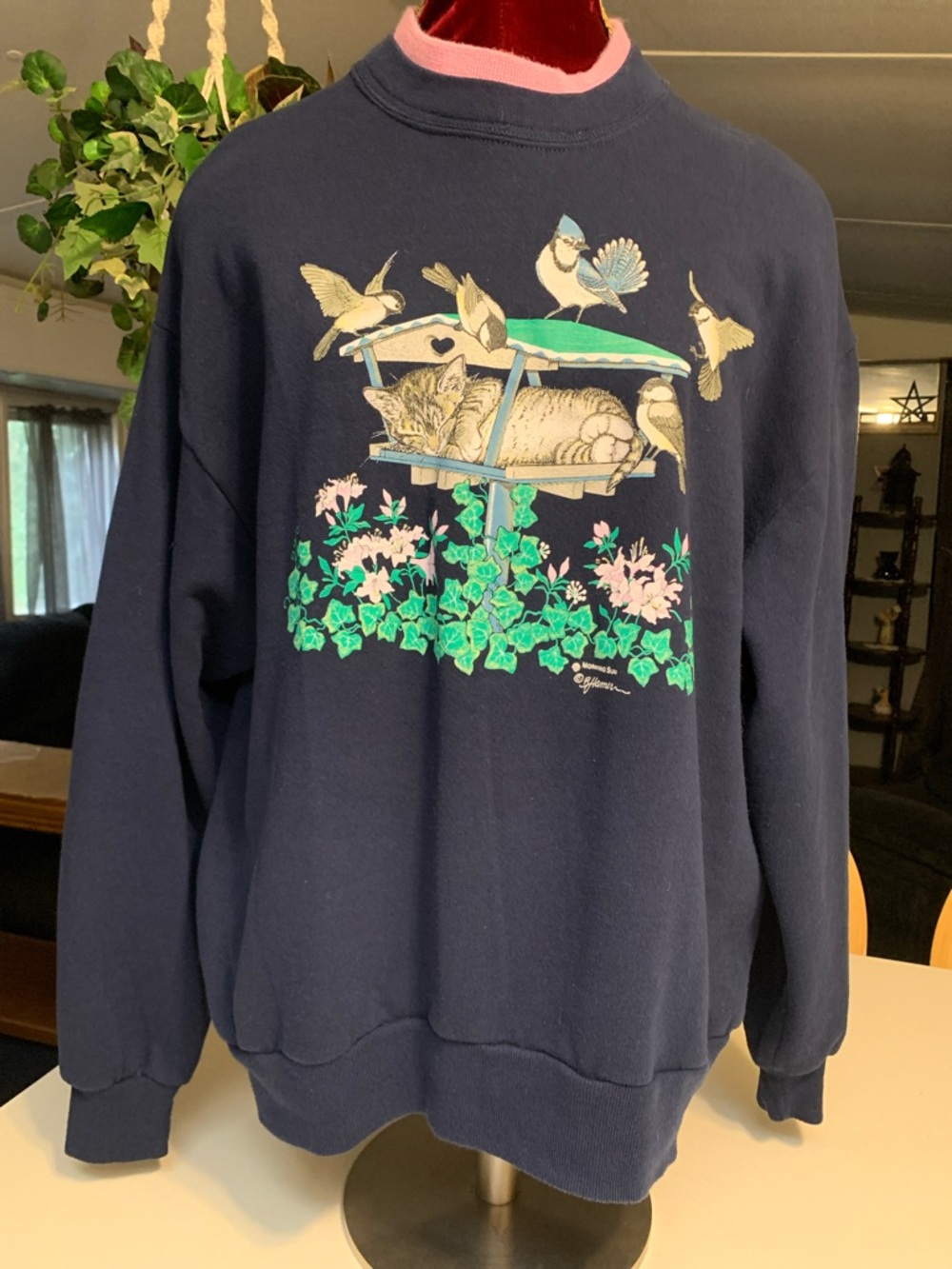 Morning Sun Graphic Sweatshirt. Blue Crewneck Sweatshirt with Cat & Bird scene
